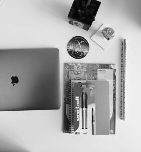 desk set up at Crayon office apple mac scale ruler pens paper